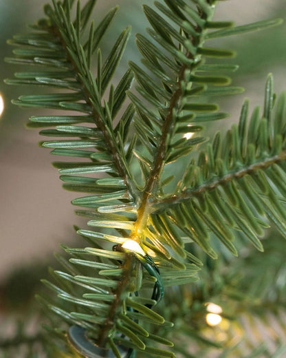 Slim Alpine Christmas Tree with Hinged Branches, Metal Stand and Built-In Micro LEDs