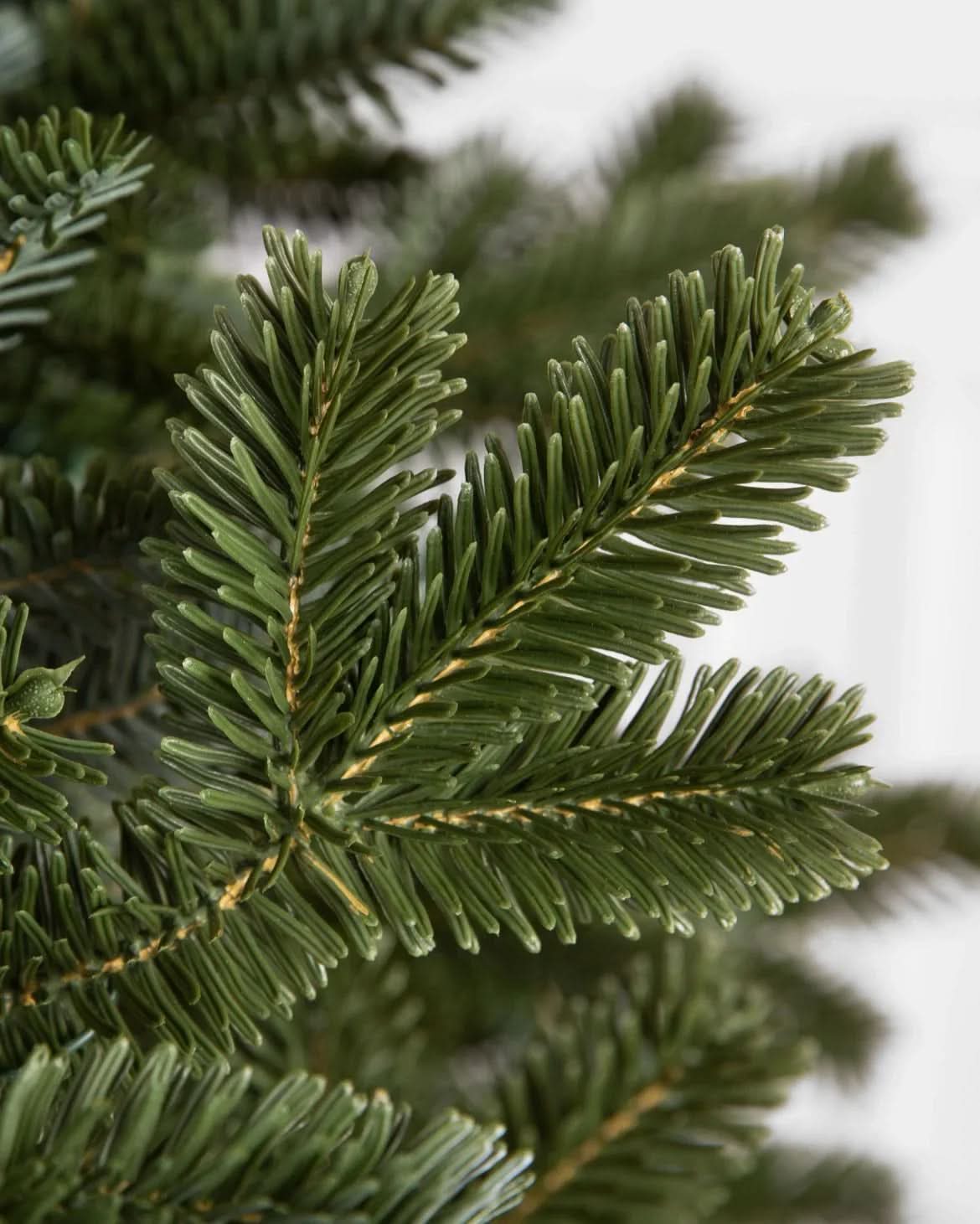 Premium Green Christmas Tree with Hinged Branches, Metal Stand with Wheels and Built-In Micro LEDs